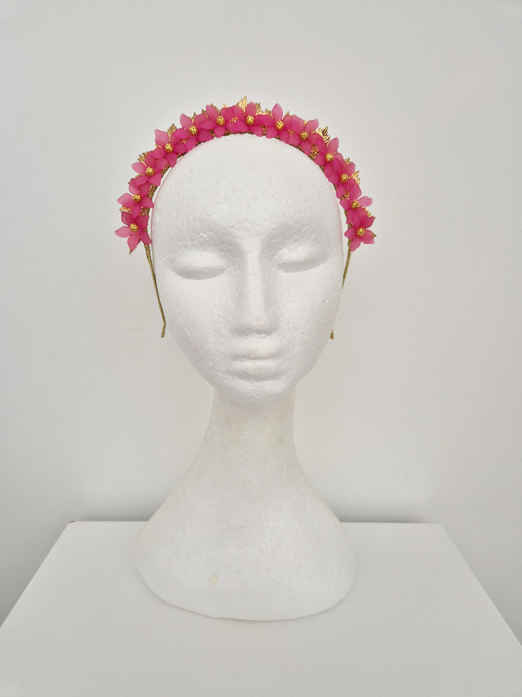 gold leaf and pink flower crown