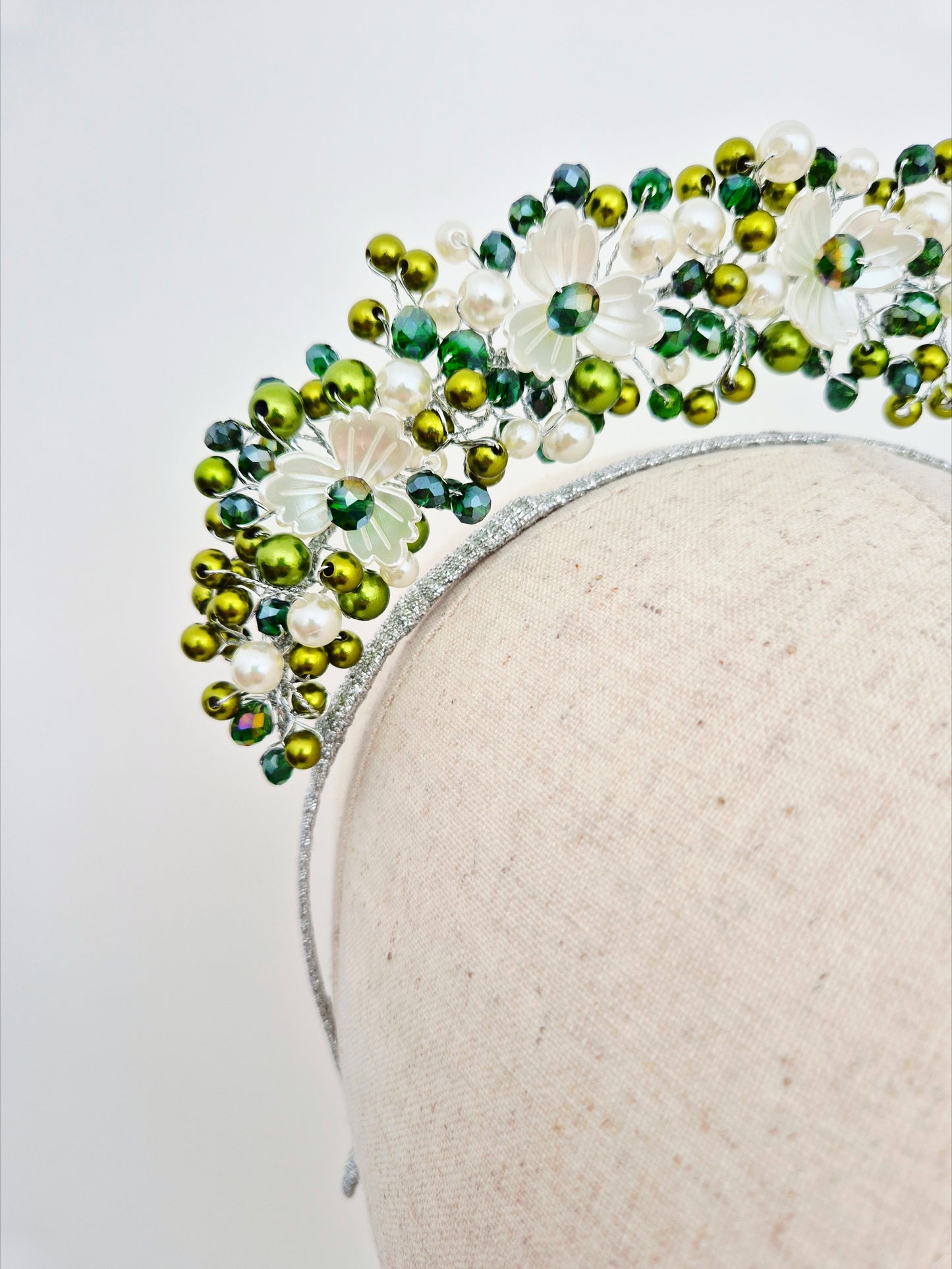 close up green tonal pearl headpiece