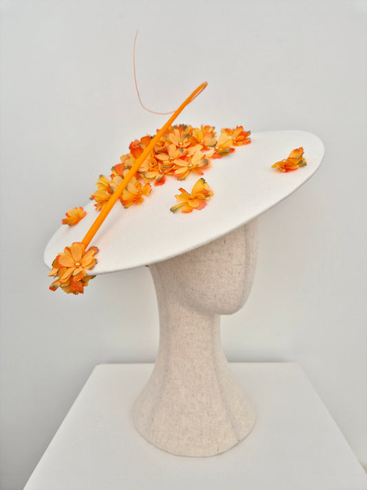 ivory coolie hat with orange petals side view