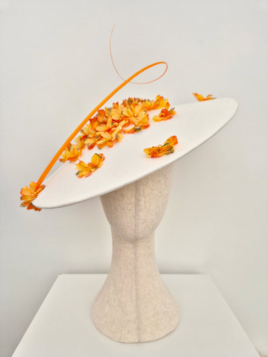 ivory coolie hat with orange petals