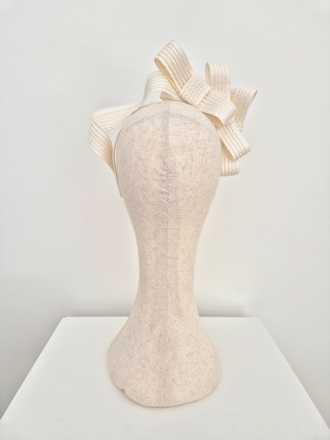 ivory stacked bow headpiece back view