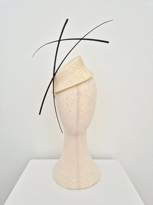 ivory straw headpiece with black quills
