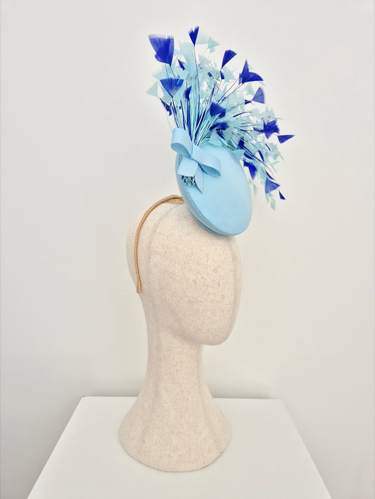 light blue percher headpiece with feathers side view