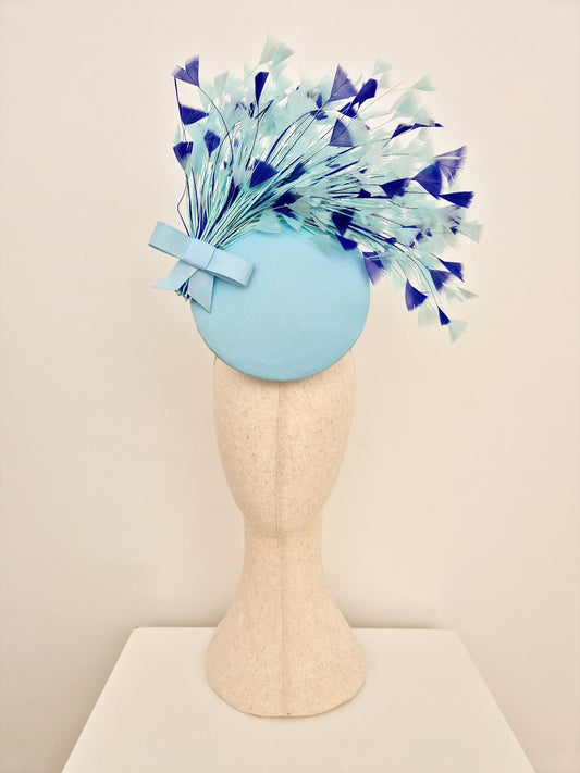 light blue percher headpiece with feathers