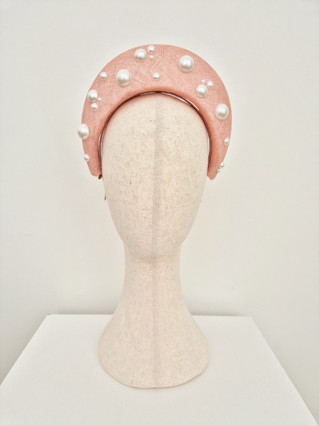 light pink straw halo headpiece with pearls