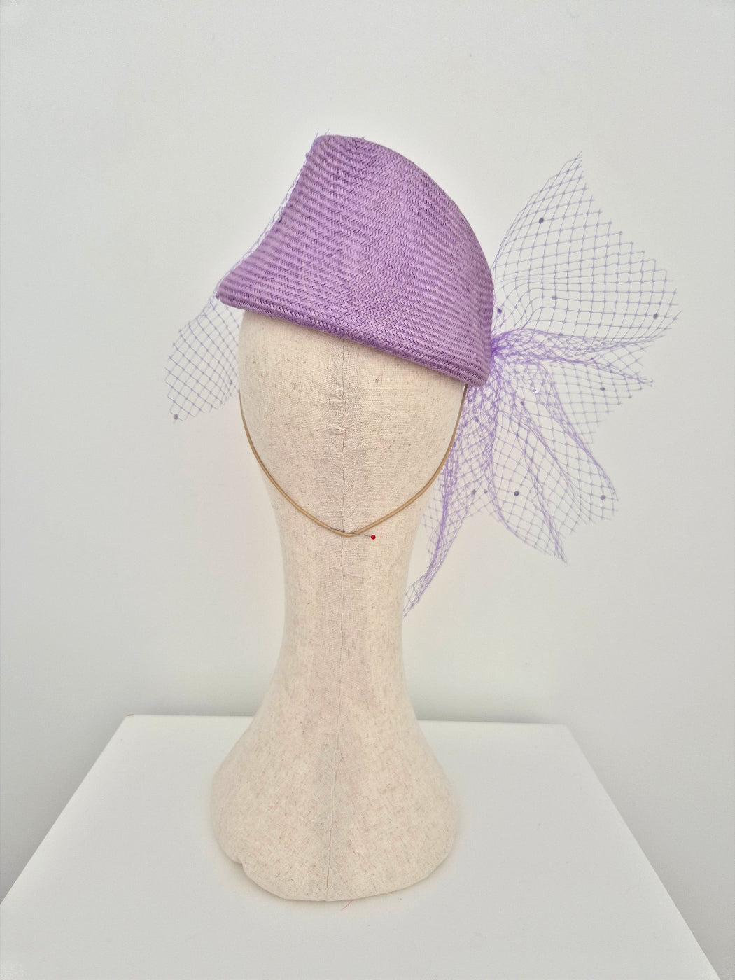 lilac straw slanted headpiece with veiling back view
