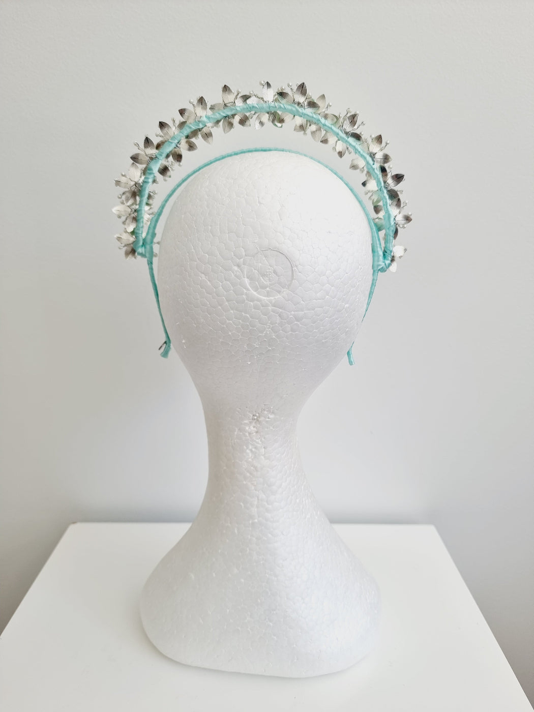mint green headpiece back view