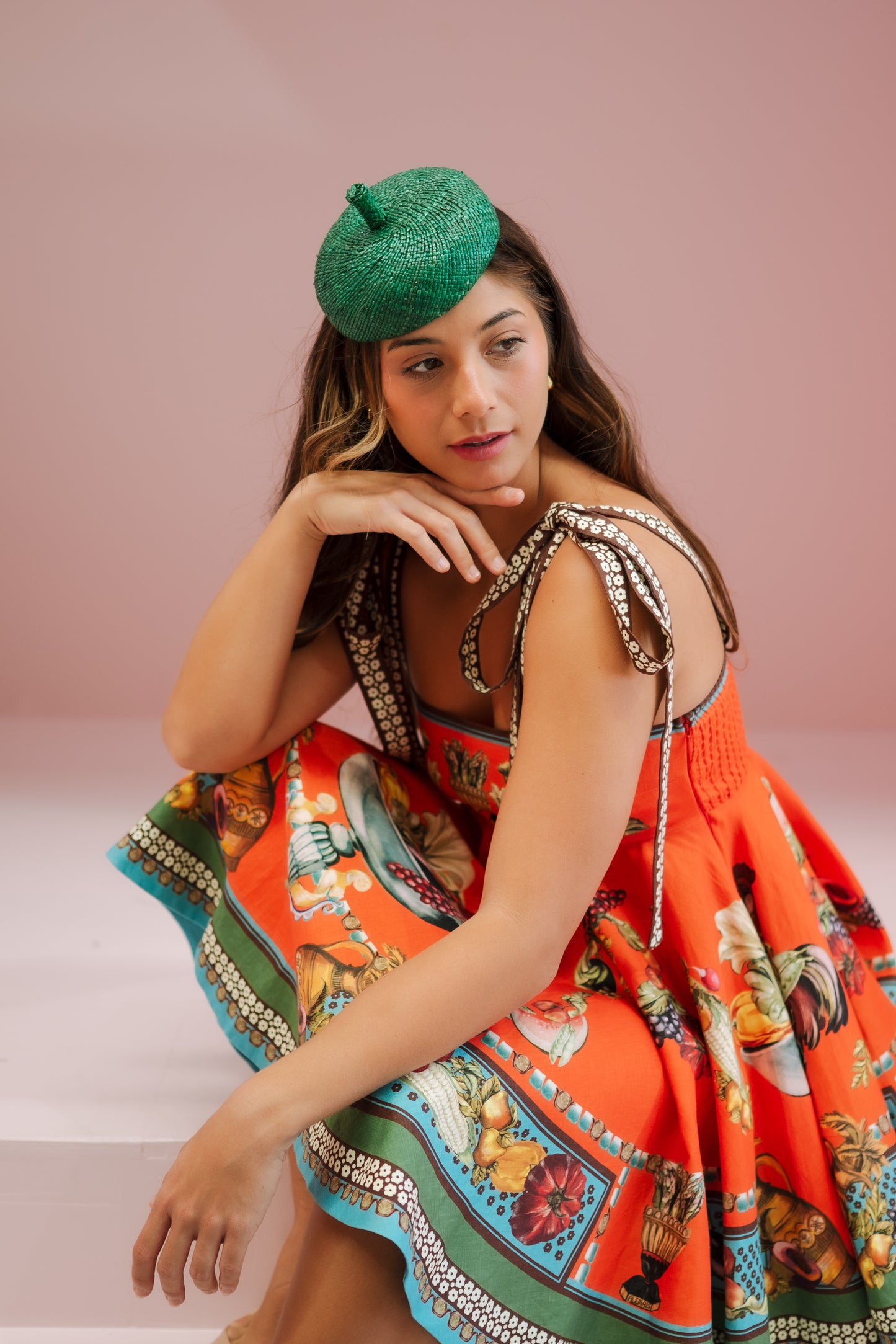 model wearing green straw beret