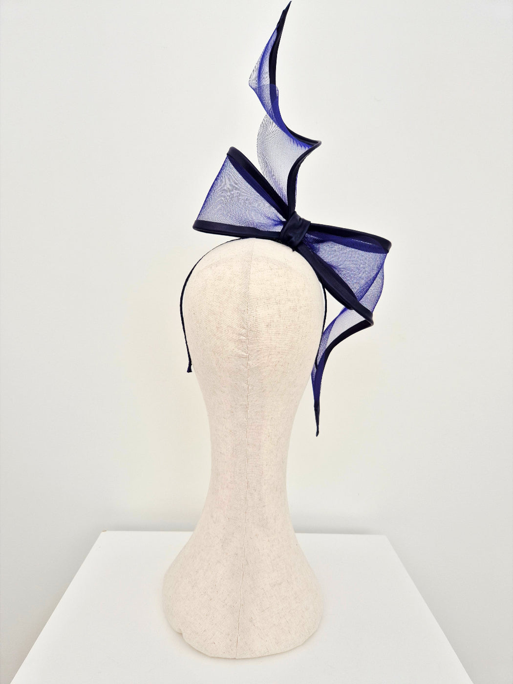 navy blue bow headpiece back view