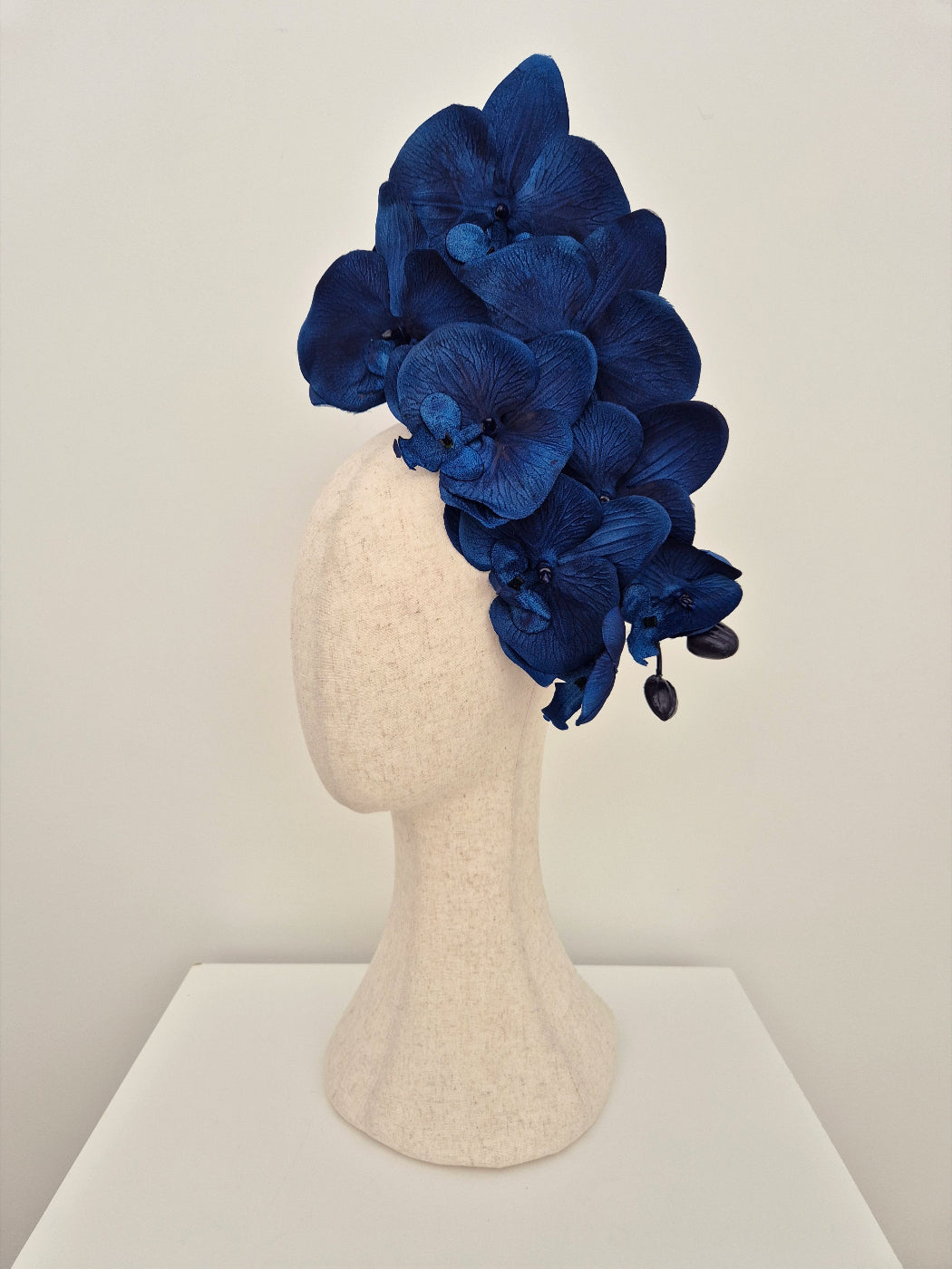 navy blue floral orchid headpiece side view