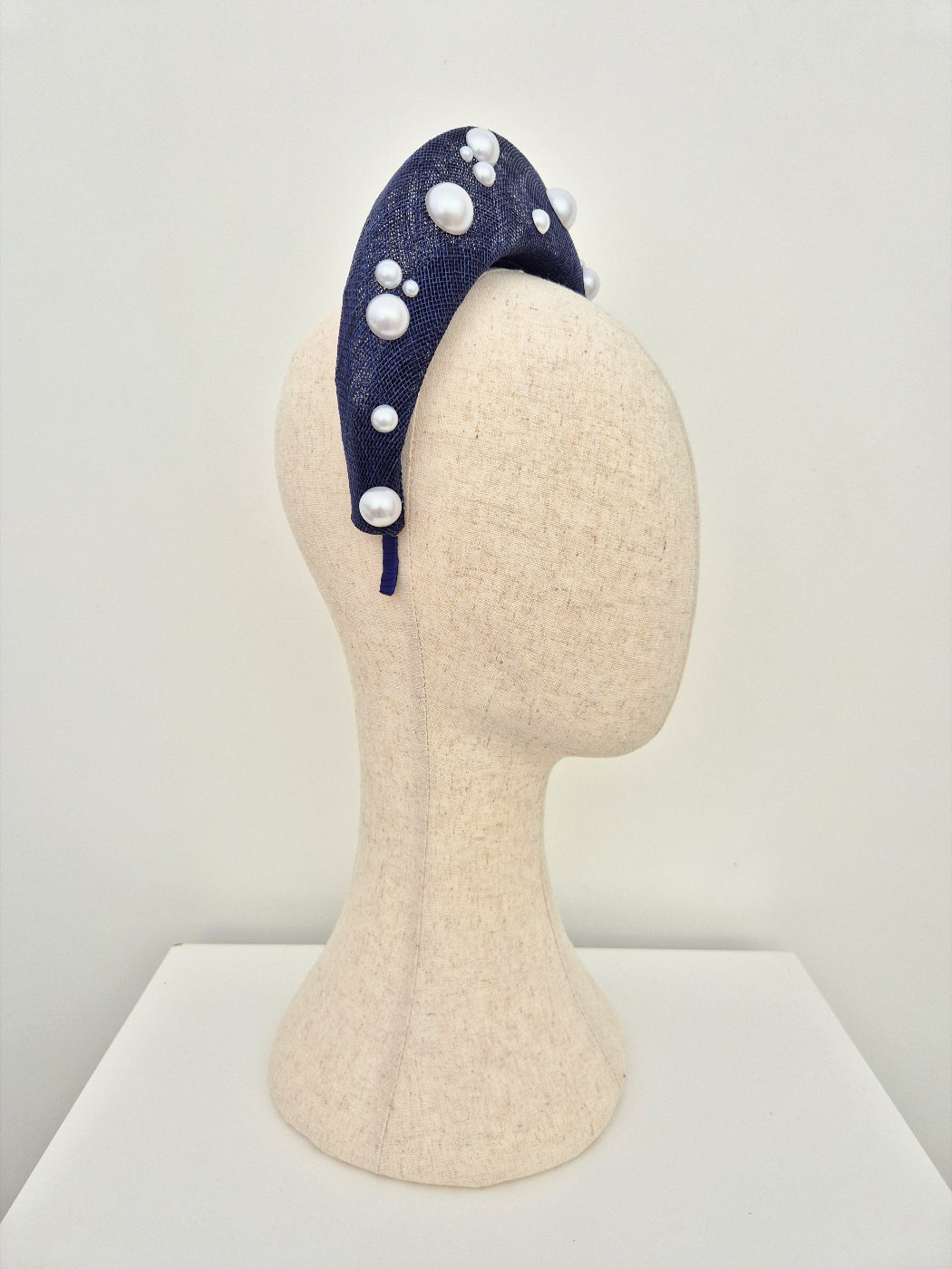 navy blue straw halo headpiece with pearls side view