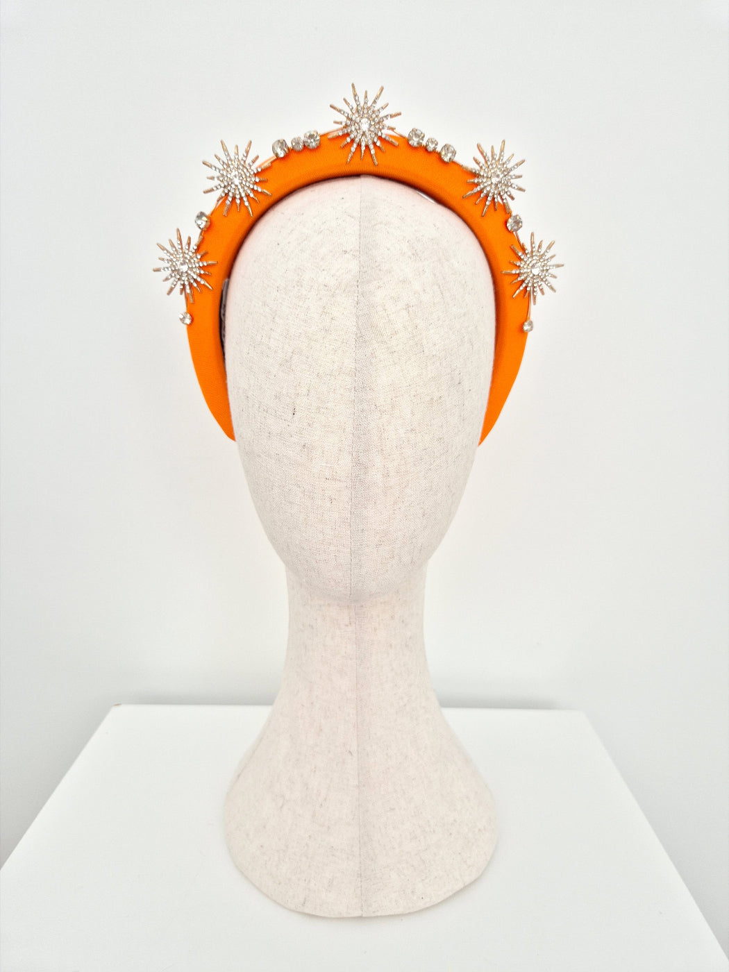 orange headband with gold stars