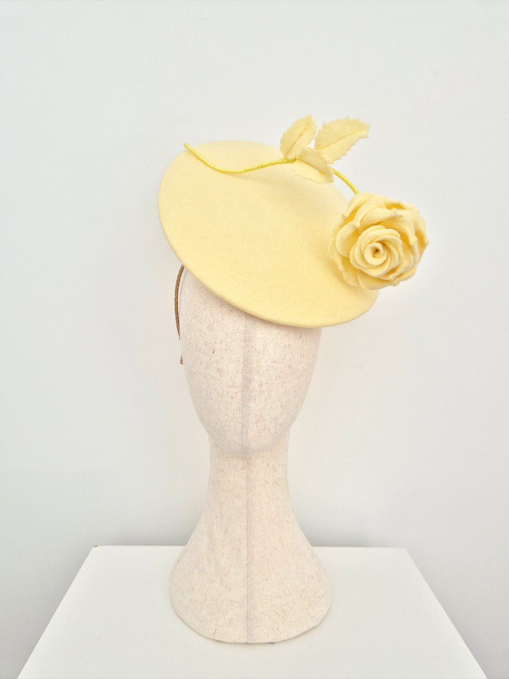 Miss Reece. Womens Pale yellow felt disk headpiece with rose ...