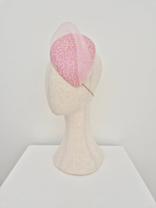 pink and cream  sequin headpiece with crinoline wave side view