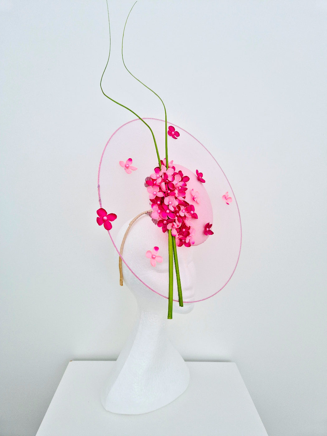 pink percher millinery side front view