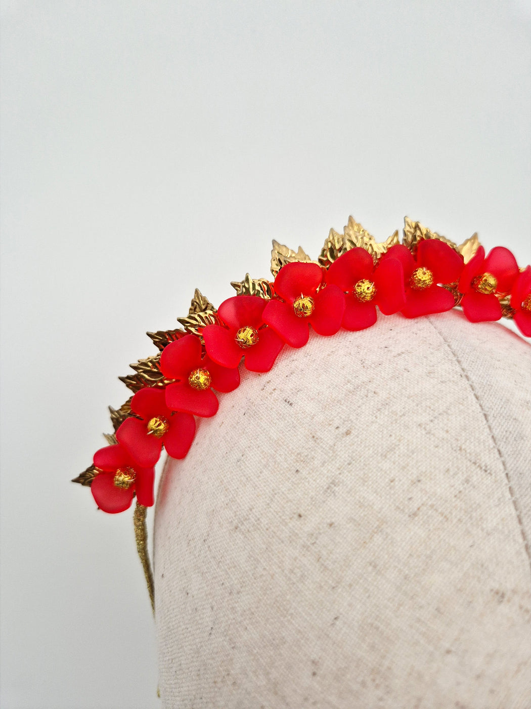 red floral headband close up
