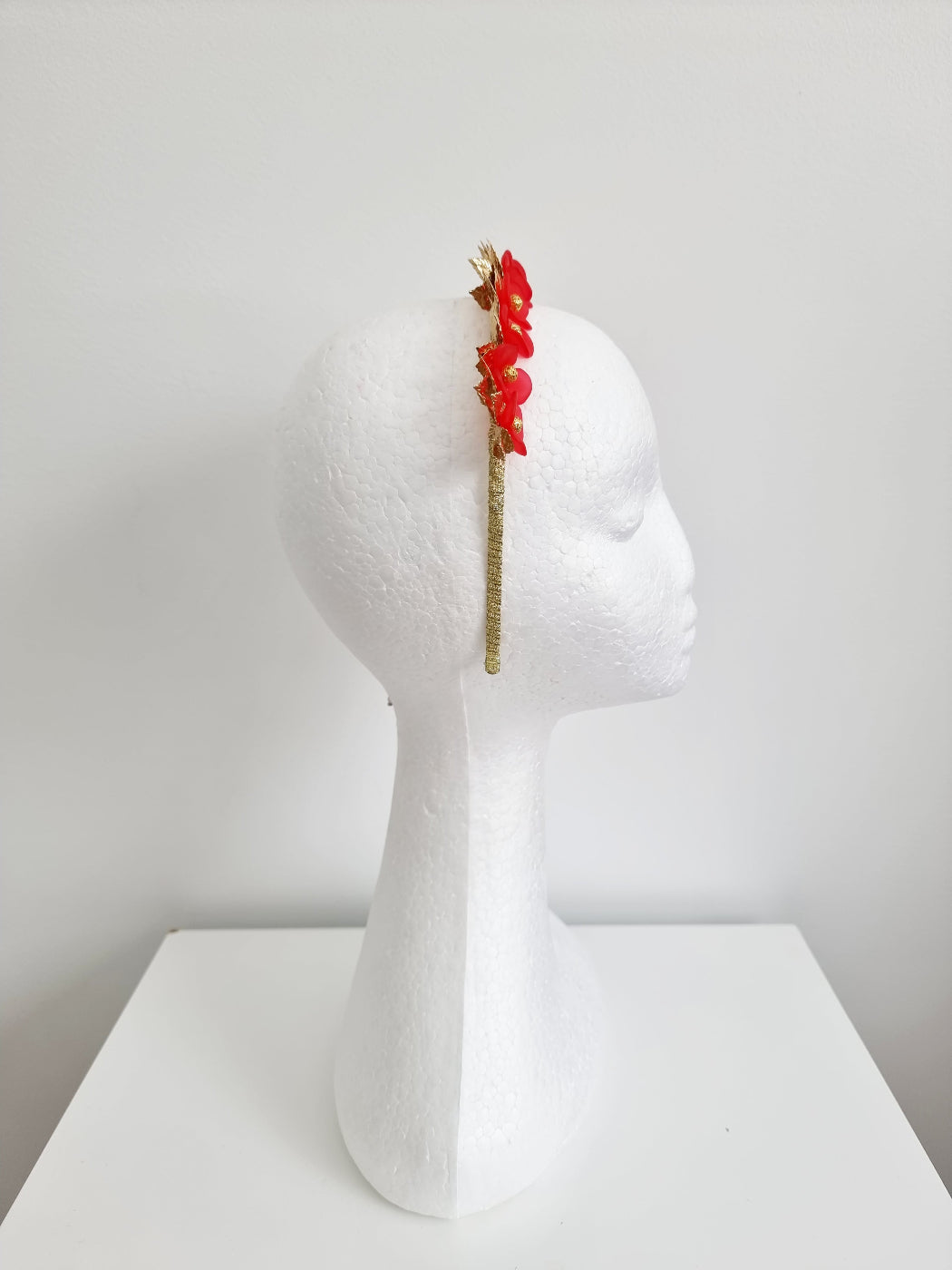 red and gold floral headpiece side view