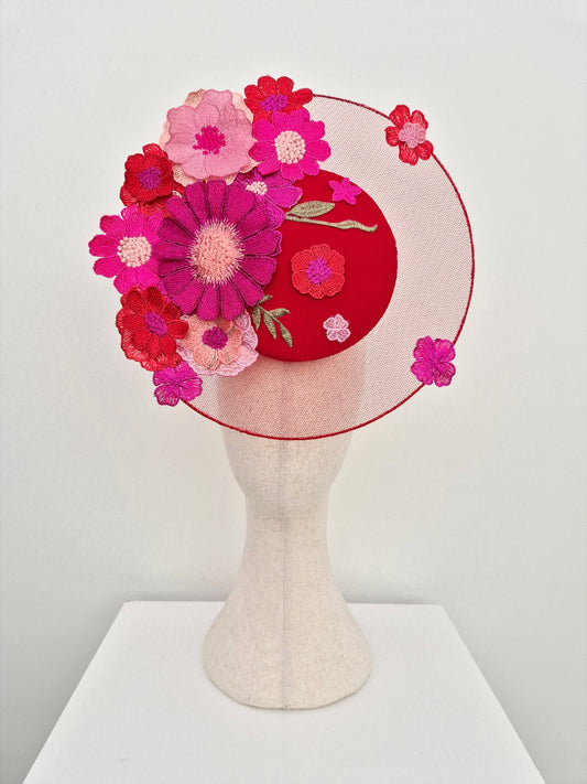red percher headpiece with pink and red tonal 3d floral lace