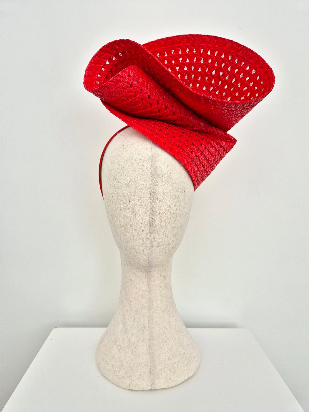 red straw headpiece