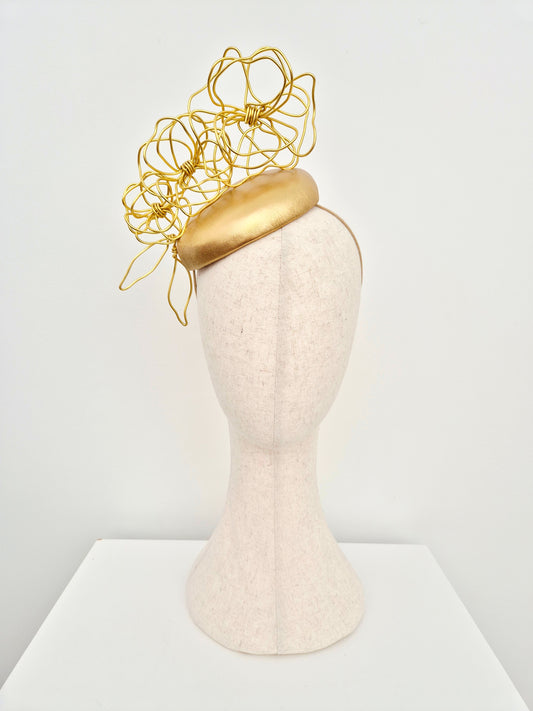 Miss Odessa.  Womens Gold leather button headpiece with gold floral wirework