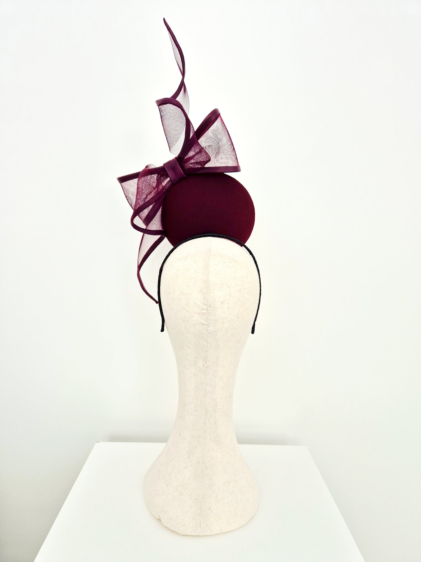 Miss Gwyneth. Womens maroon button percher headpiece with crinoline bow swirl