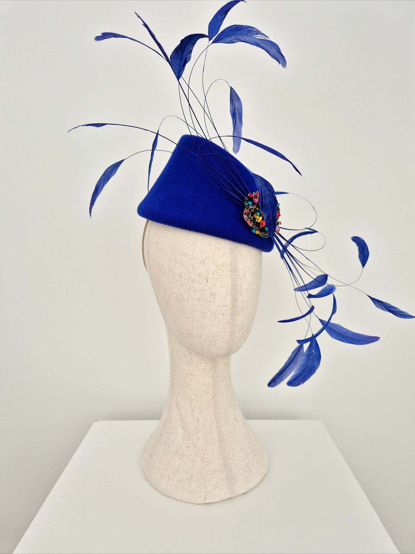 Miss Hope. Womens Blue wool felt headpiece with feathers