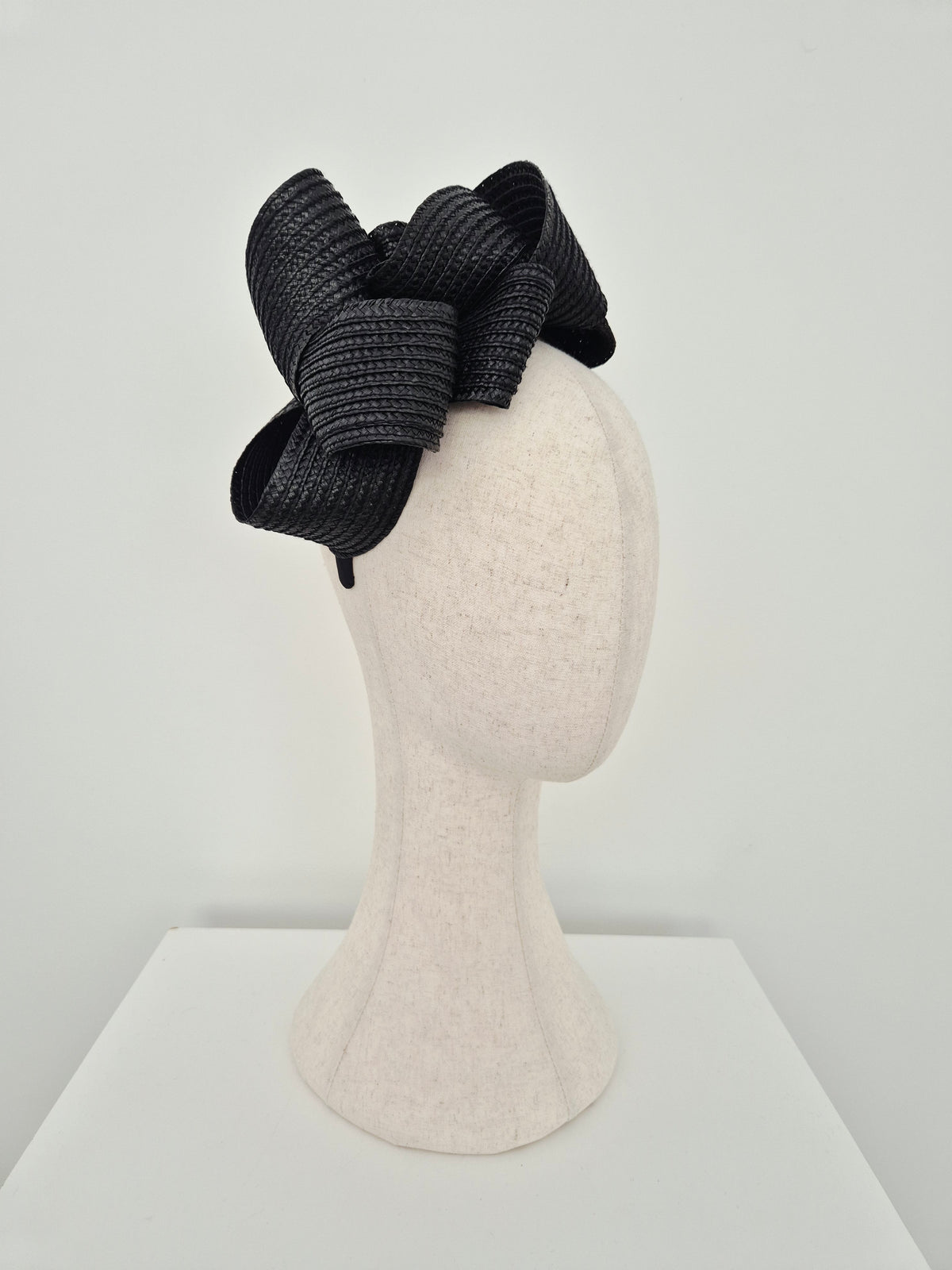 Miss Samantha. Womens braided loop headpiece in Black