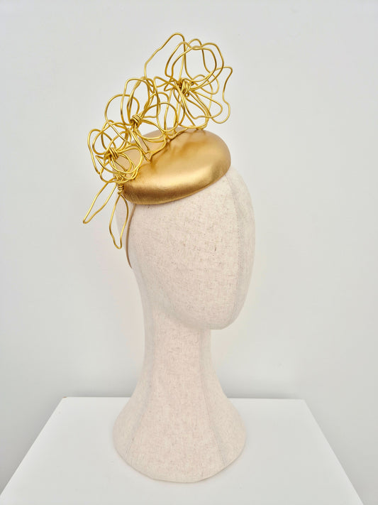 Miss Odessa.  Womens Gold leather button headpiece with gold floral wirework