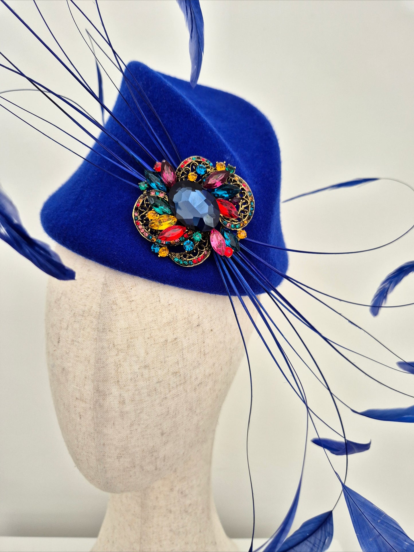 Miss Hope. Womens Blue wool felt headpiece with feathers