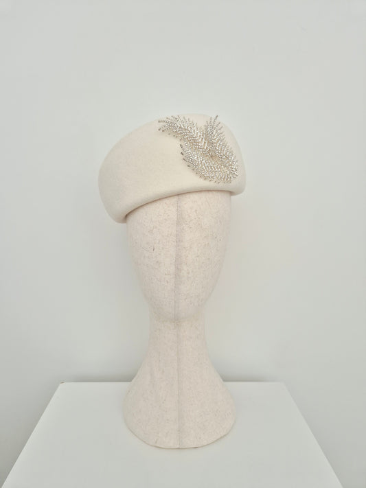 Miss Fern. Womens ivory wool felt beret style headpiece with silver rhinestone fern