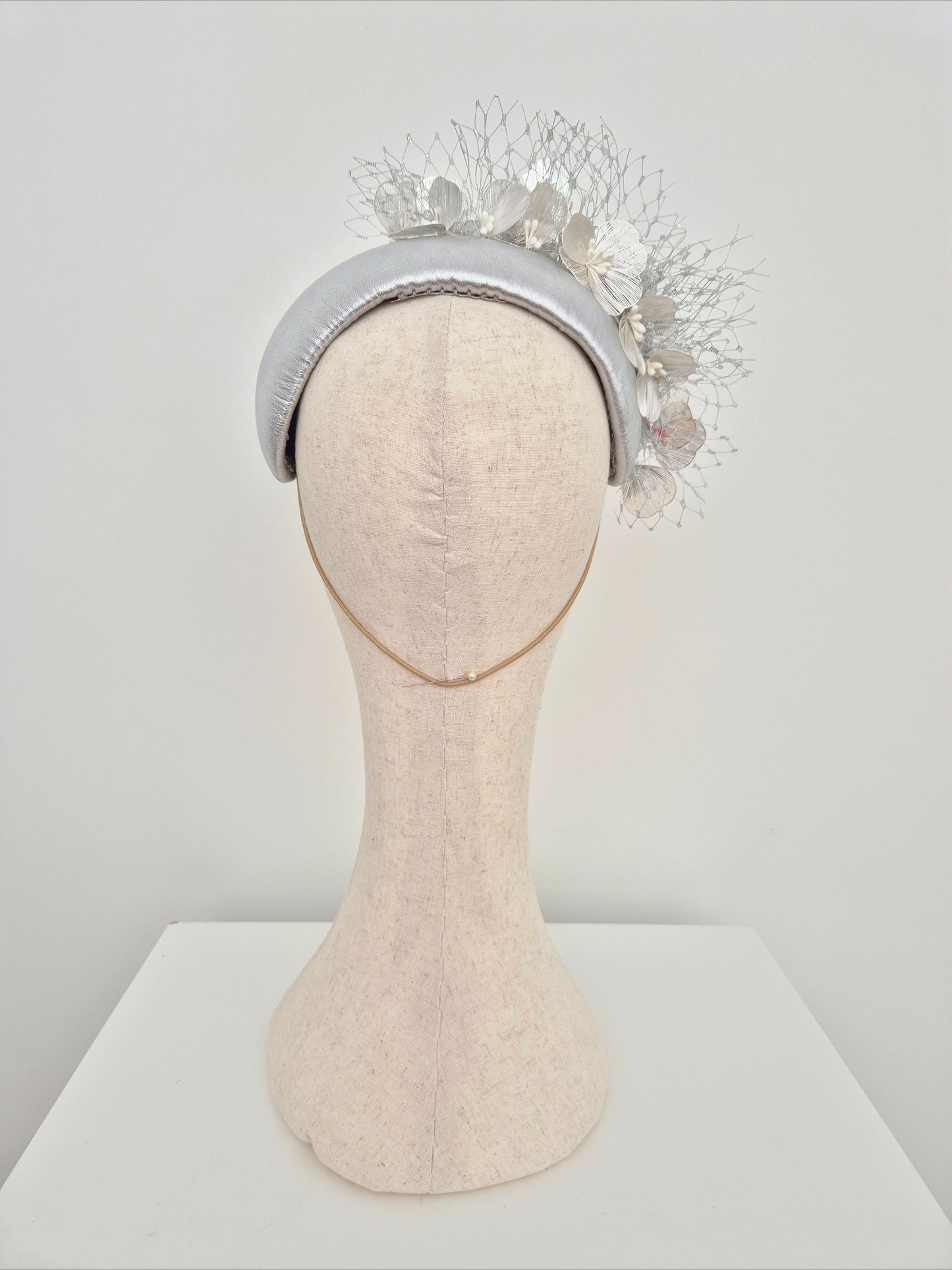Miss Kinsley. Womens Silver leather bandeau headpiece with silver flowers