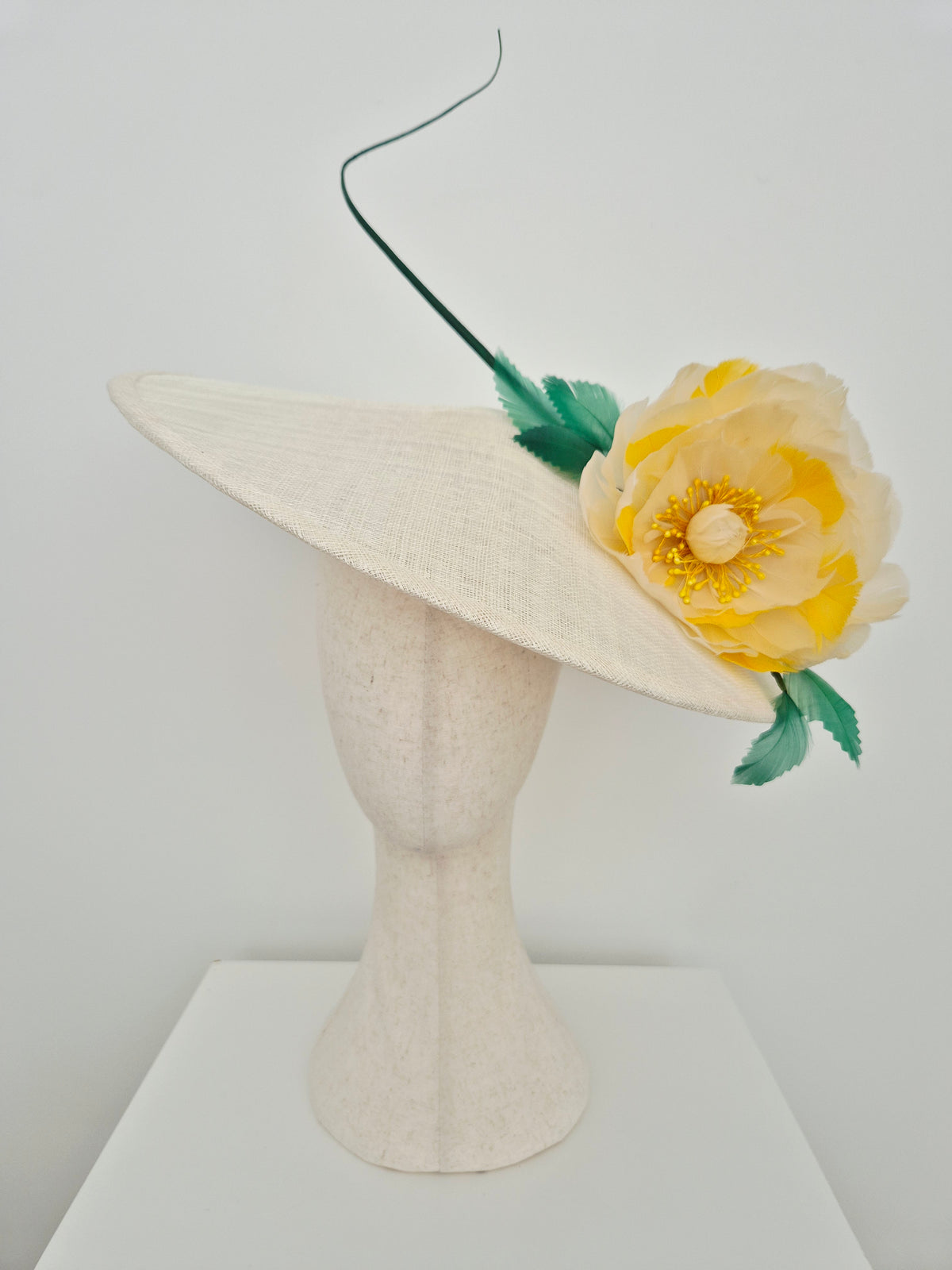 Miss Gemma . Womens Ivory straw coolie hat with yellow feather flower
