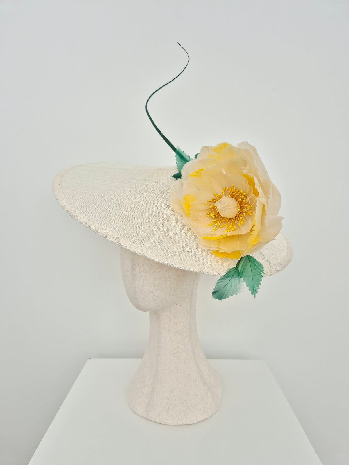 Miss Gemma . Womens Ivory straw coolie hat with yellow feather flower