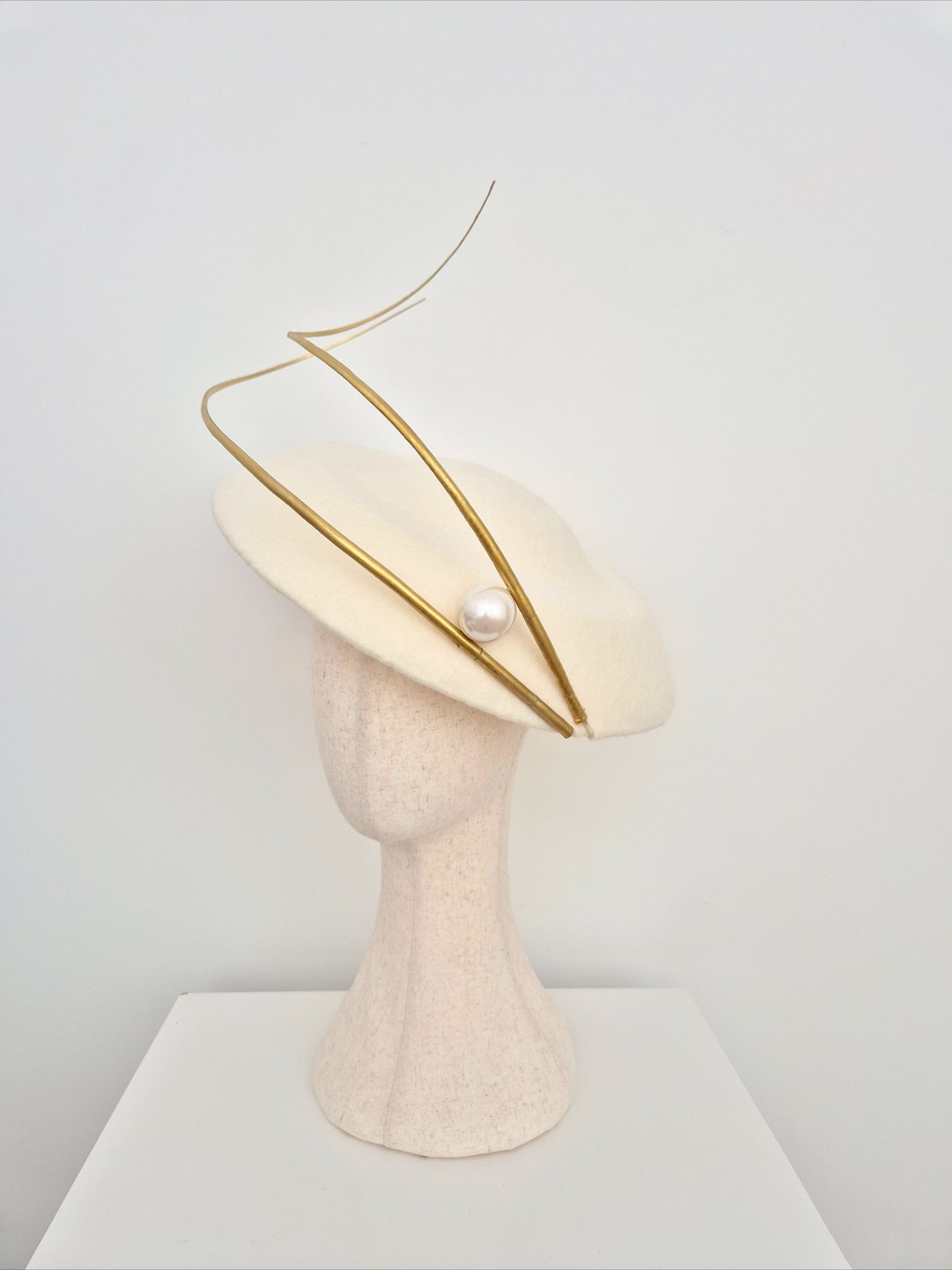 Miss Sasha. Womens Ecru wool felt hat with gold quills and pearl