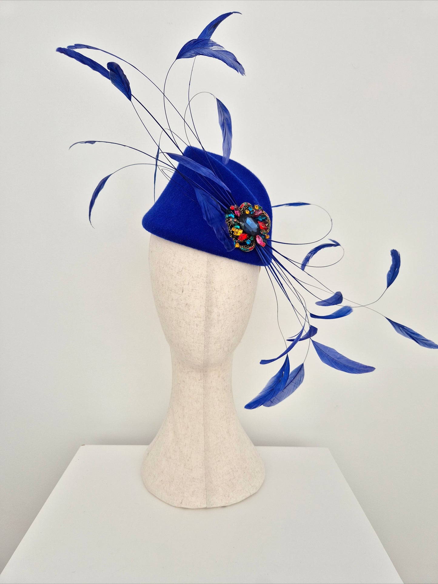 Miss Hope. Womens Blue wool felt headpiece with feathers