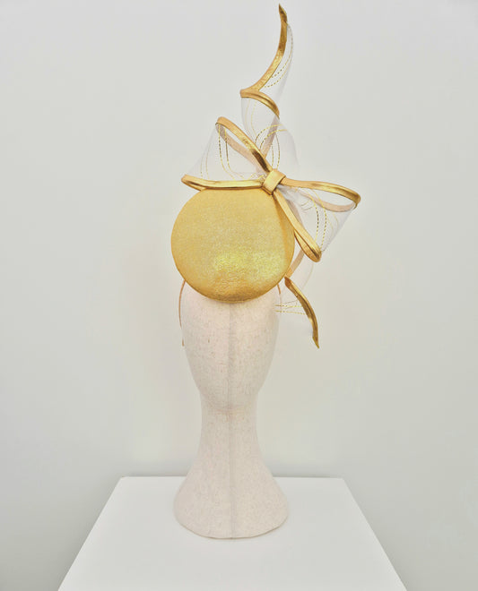 Miss Gwyneth. Womens Gold button percher headpiece with crinoline bow swirl