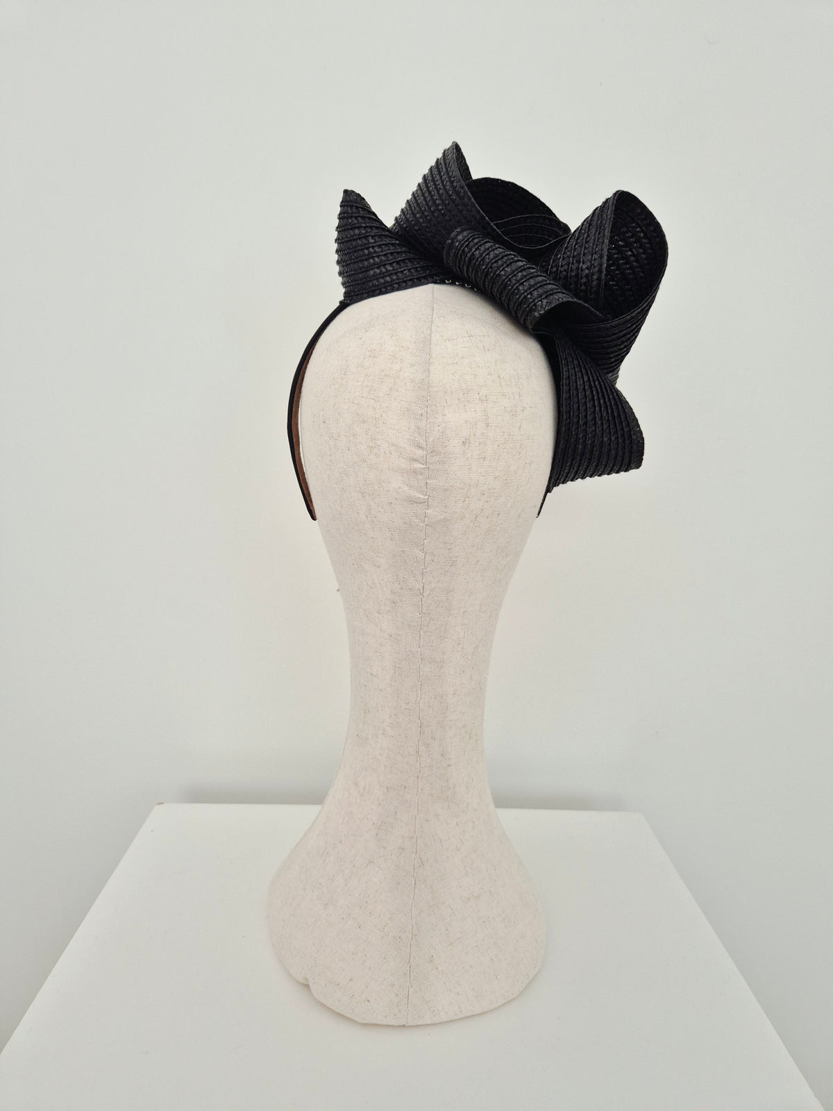 Miss Samantha. Womens braided loop headpiece in Black
