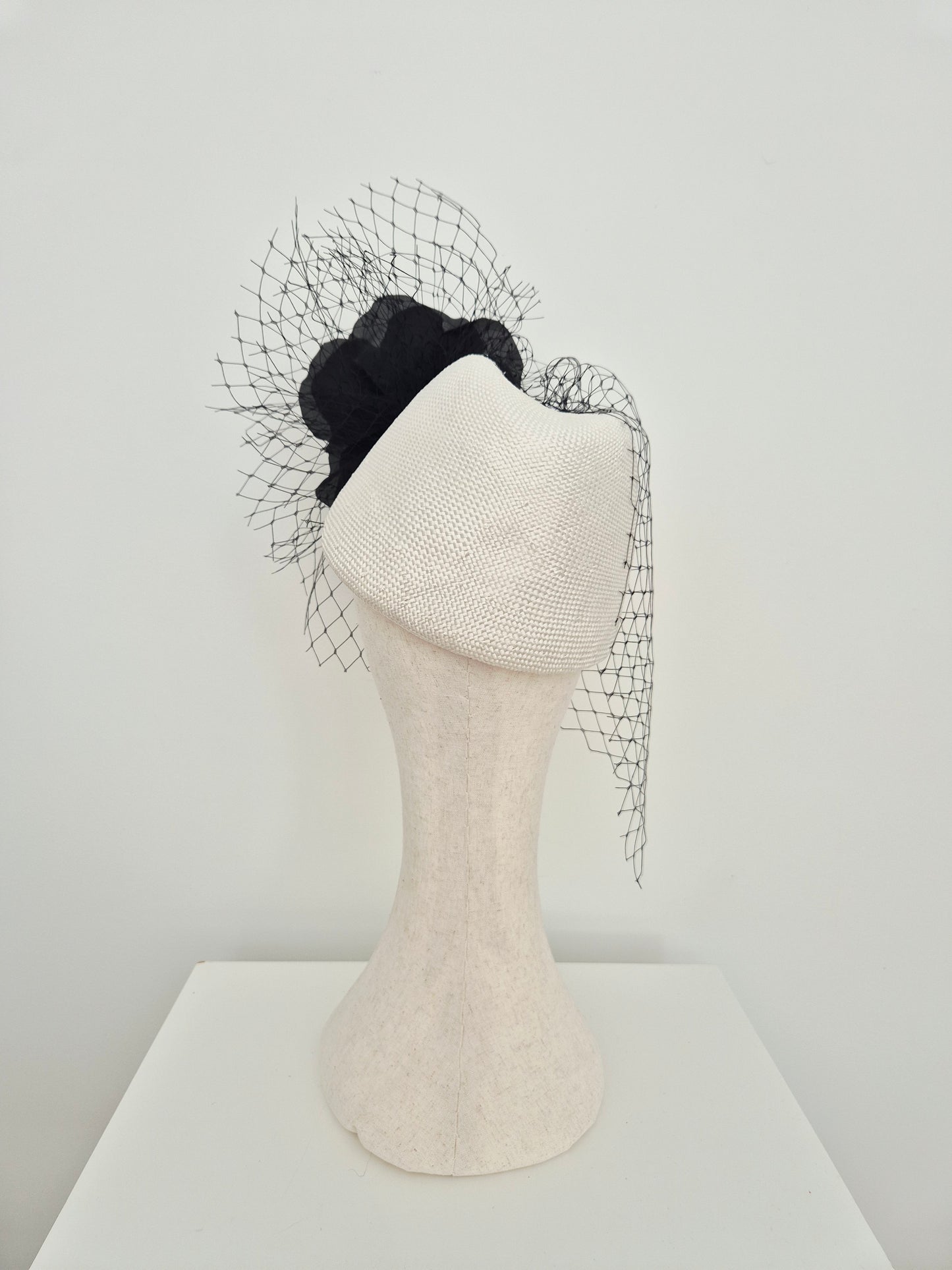 Miss Cleo. Womens white straw topper headpiece with silk rose and veiling