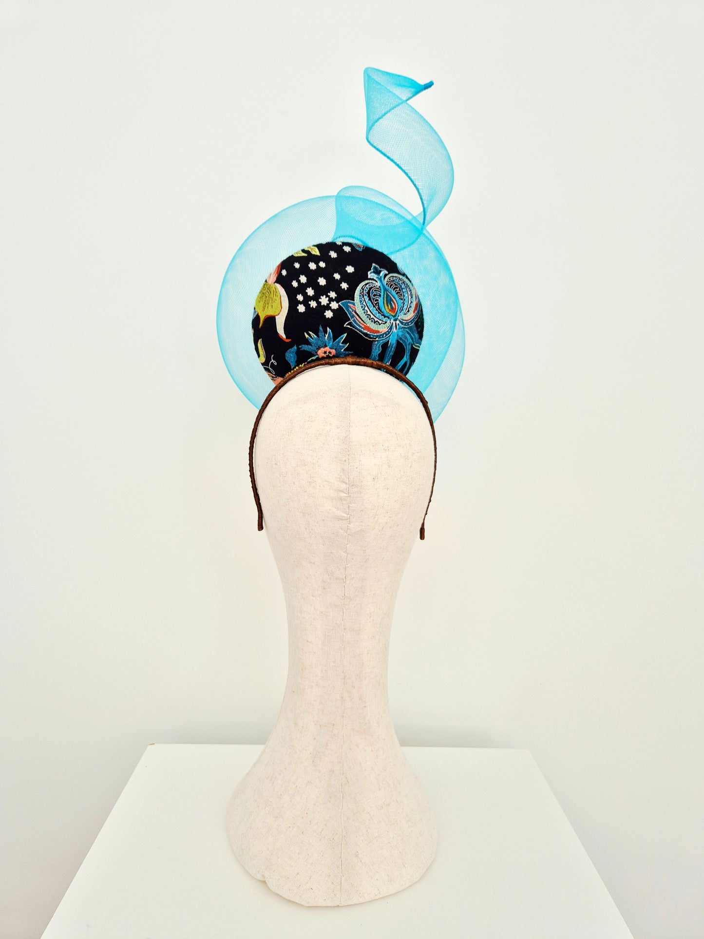 Miss Duke. Womens brocade button percher headpiece with crinoline swirl