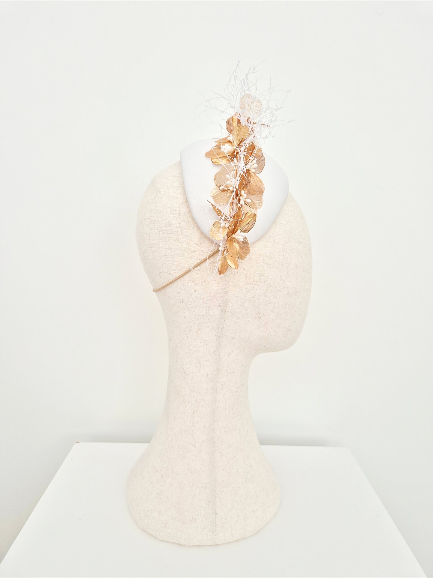 Miss Kinsley. Womens white leather bandeau headpiece with gold flowers