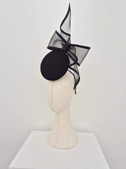 side front black percher headpiece with bow