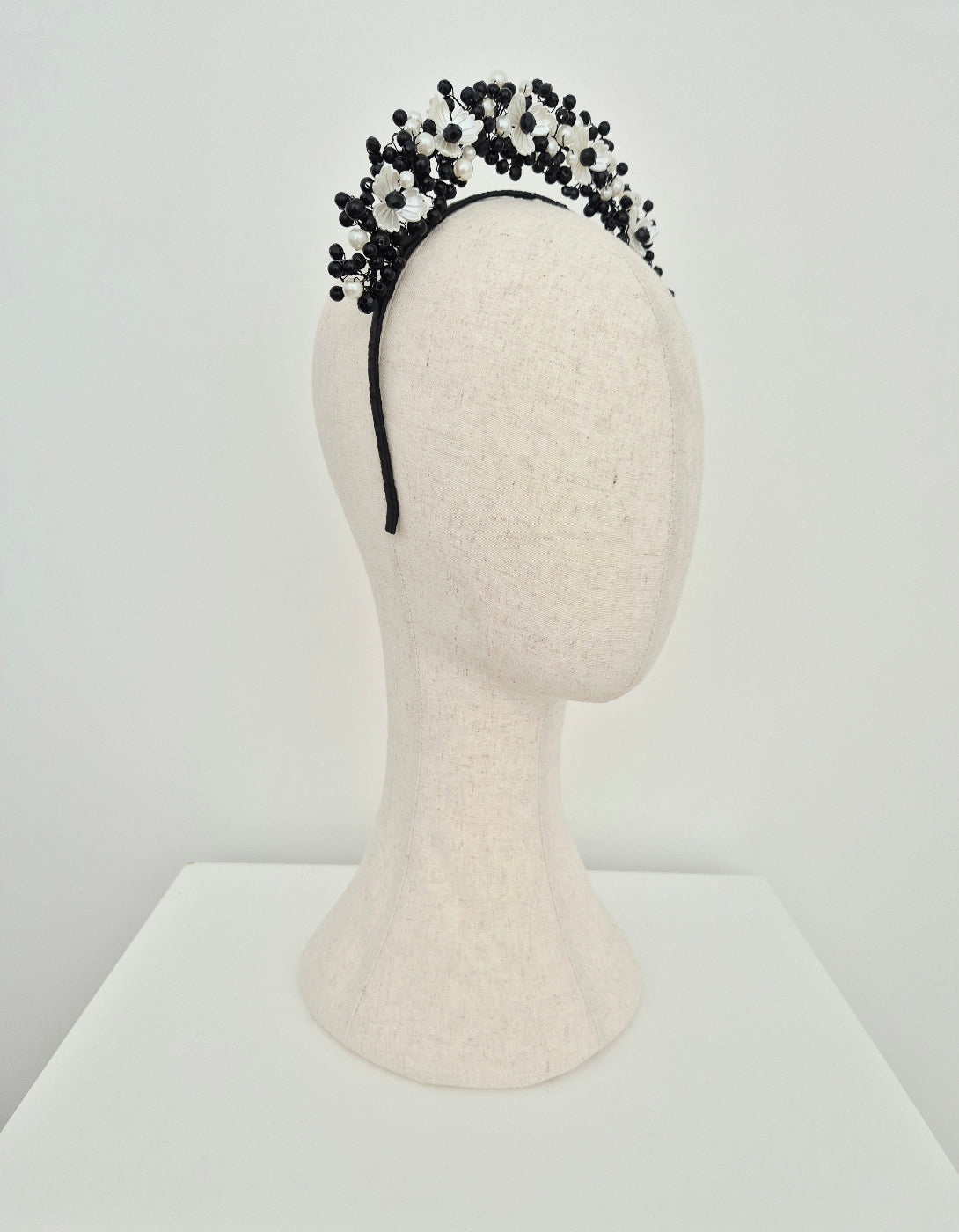 side view black and pearl headpiece