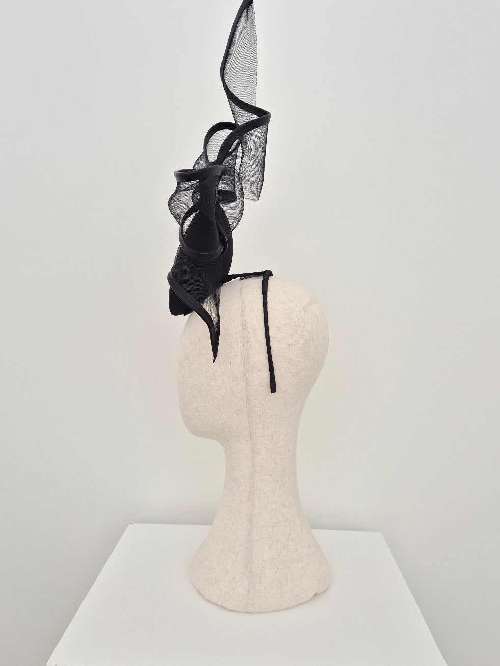 side view black pecher headpiece