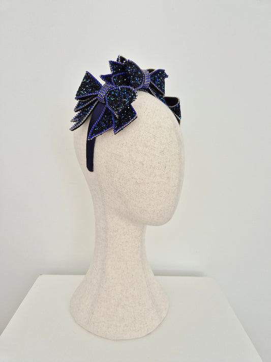 side view dark blue rhinestone bow headpiece