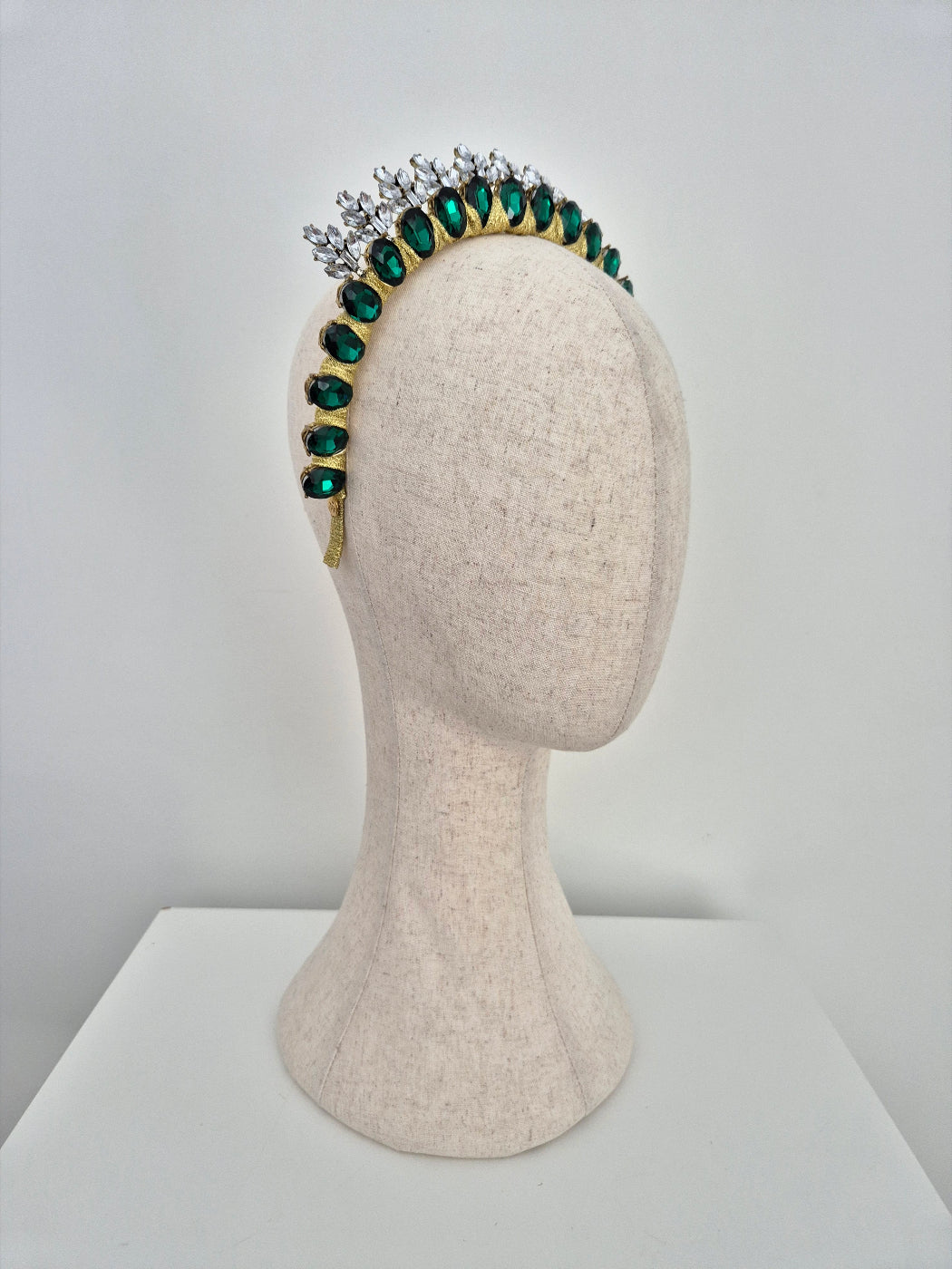 side view emerald green rhinestone crown
