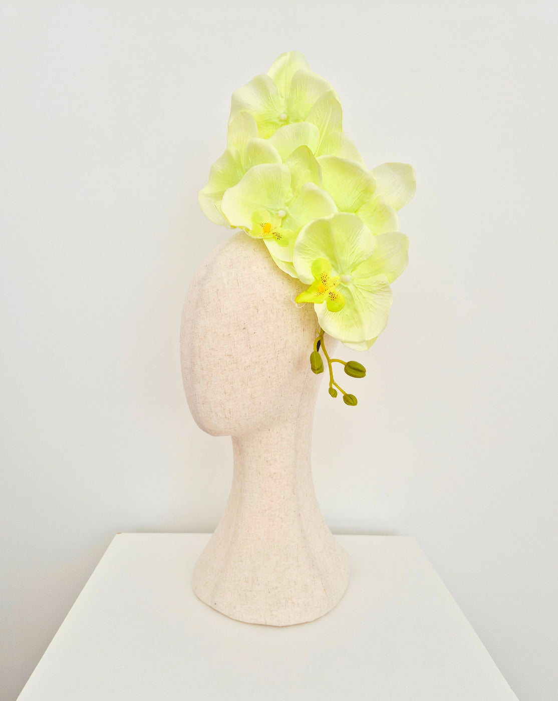 side-view-pale-lime-green-floral-orchid-headpiece