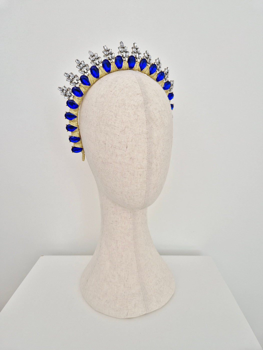 side view royal blue rhinestone crown