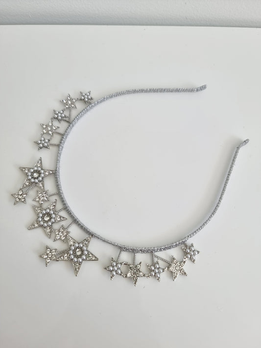 silver star headpiece flat lay