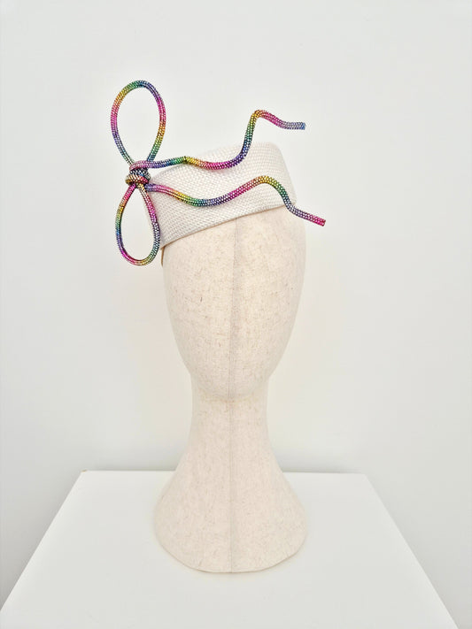 white pillbox with rhinestone bow