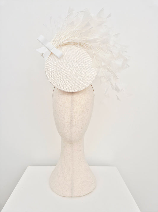white straw percher headpiece with feathers